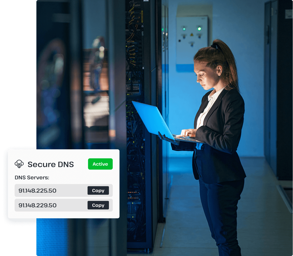 A woman working in a server room types on a laptop, representing the hardworking UsenetServer operations responsible for maintaining secure DNS functionality.
