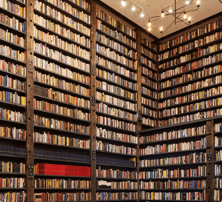 A large library with full shelves, representing the ‘misc’ Usenet newsgroup where users can have any type of discussions.