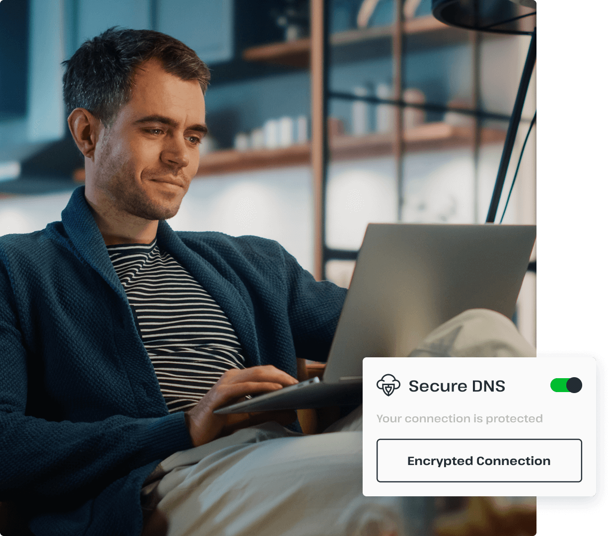 A man typing on a laptop is ensuring his connection is encrypted and secure with the help of UsenetServer’s secure DNS capabilities.