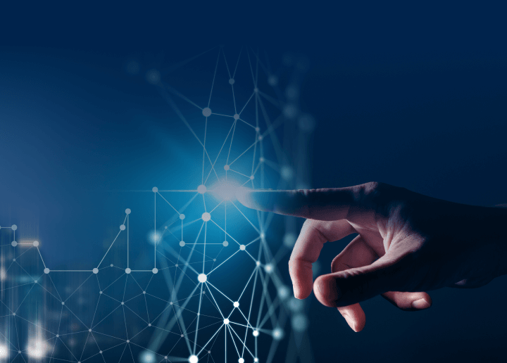 Woman browsing Usenet newsgroups on a laptop in a digital library setting.