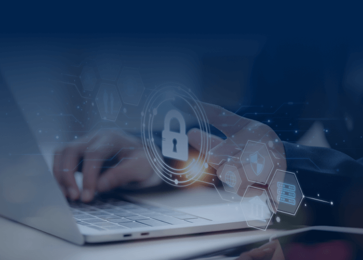 A person typing on an open laptop with a floating graphic of a lock over the keyboard to show that UsenetServer offers premium security benefits for Usenet users.